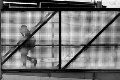 Metal fence by building