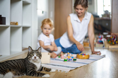 Woman and cat at home