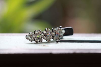 Close-up of hairpins on table