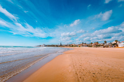 Scenic view of beach against sky