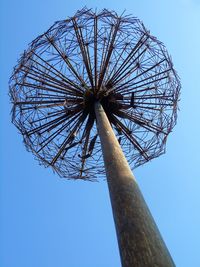 Low angle view of tree against clear blue sky