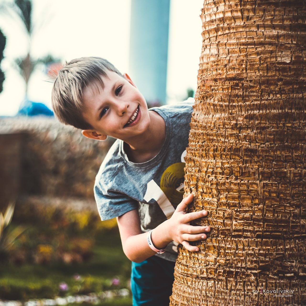 happiness, looking at camera, one person, smiling, emotion, real people, portrait, child, casual clothing, day, males, childhood, men, boys, lifestyles, waist up, standing, leisure activity, outdoors, mouth open, innocence