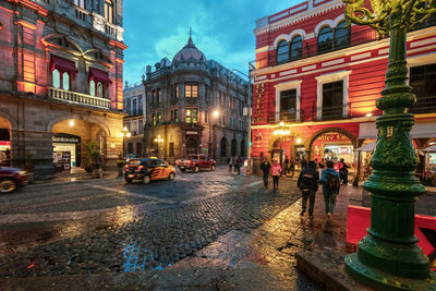 City street and buildings at dusk