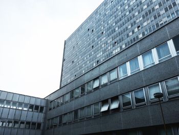 Low angle view of modern building against clear sky