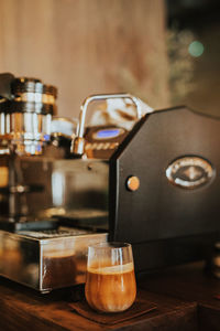 Close-up of coffee cup on table