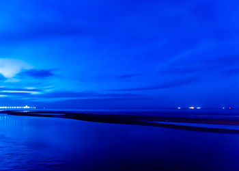 Scenic view of sea against sky at night