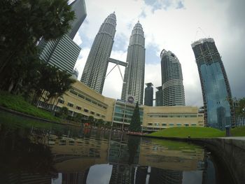 Low angle view of skyscrapers against sky