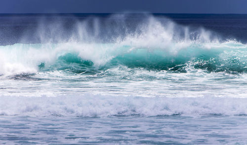 Waves splashing on rocks