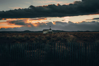 Scenic view of landscape against sky during sunset