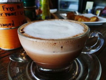 Close-up of coffee cup on table