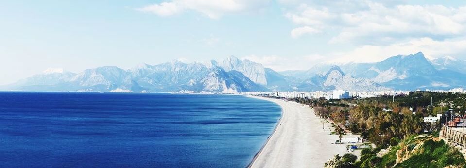 mountain, water, mountain range, scenics, beauty in nature, tranquil scene, sea, sky, tranquility, nature, blue, idyllic, lake, transportation, day, cloud - sky, non-urban scene, river, outdoors, landscape