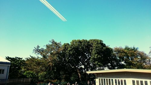 Low angle view of built structure against clear blue sky