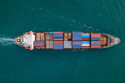 High angle view of ship floating on sea