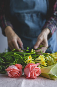 Midsection of person preparing food