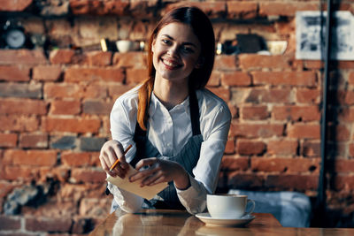 Portrait of woman with coffee