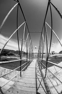 View of bridge against cloudy sky