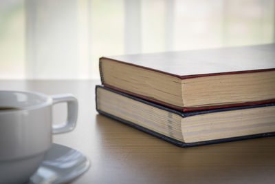 Close-up of coffee cup on table