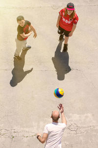 High angle view of men playing with ball