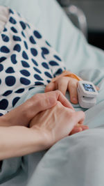 Mother consoling daughter at hospital