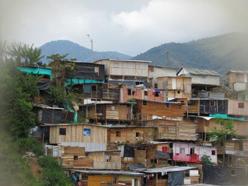 Buildings in city against sky