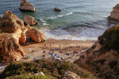 Scenic view of sea against sky on beach, portimao, portugal. 