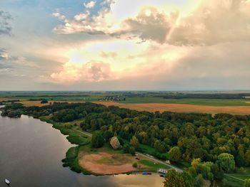 Scenic view of landscape against sky during sunset