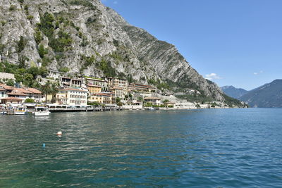 Scenic view of sea with mountain in background