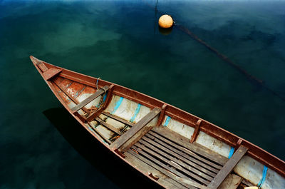 High angle view of boat moored in water