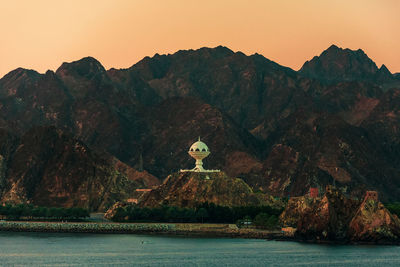 Lake with mountain range in the background