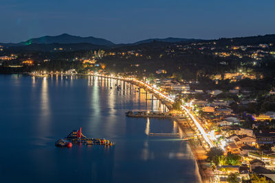 High angle view of illuminated city at night