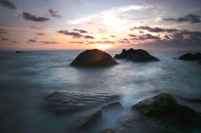 Scenic view of sea against sky during sunset