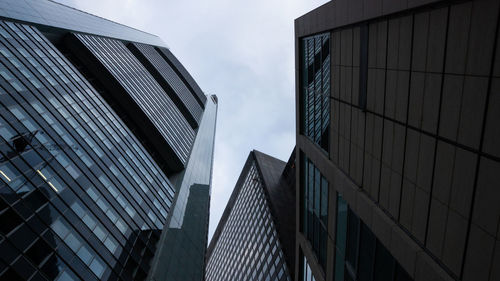 Low angle view of modern buildings against sky