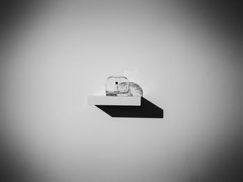 Electric lamp against wall