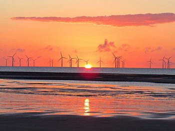 Scenic view of sea against sky at sunset