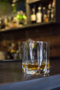 Close-up of wine in glass on table