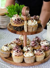 Close-up of cupcakes on cake