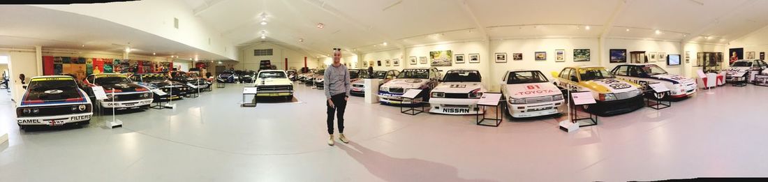 Panoramic view of row of cars