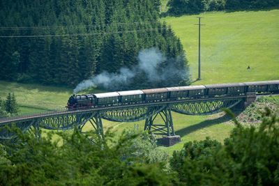 Steamtrain on railroadbridge near epfenhofen, blackforest