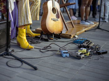 Low section of people playing guitar