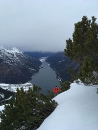 High angle view of snowcapped mountain against sky