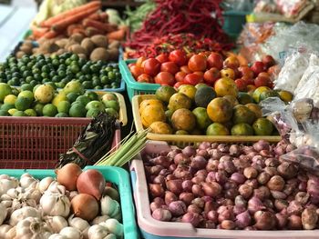 Some groceries are sold at a traditional market in the city of serui, yapen island, indonesia