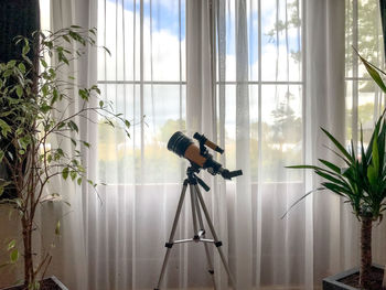 Telescope at window