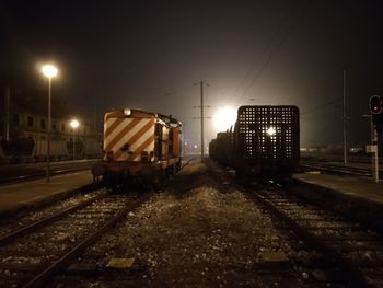 Train on railroad track at night