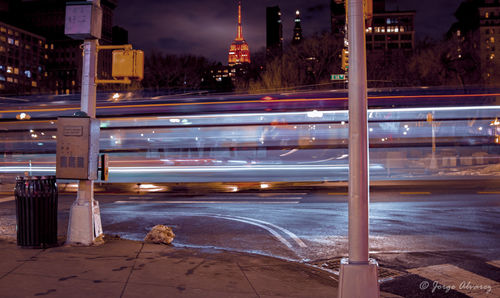 Light trails on street in city at night