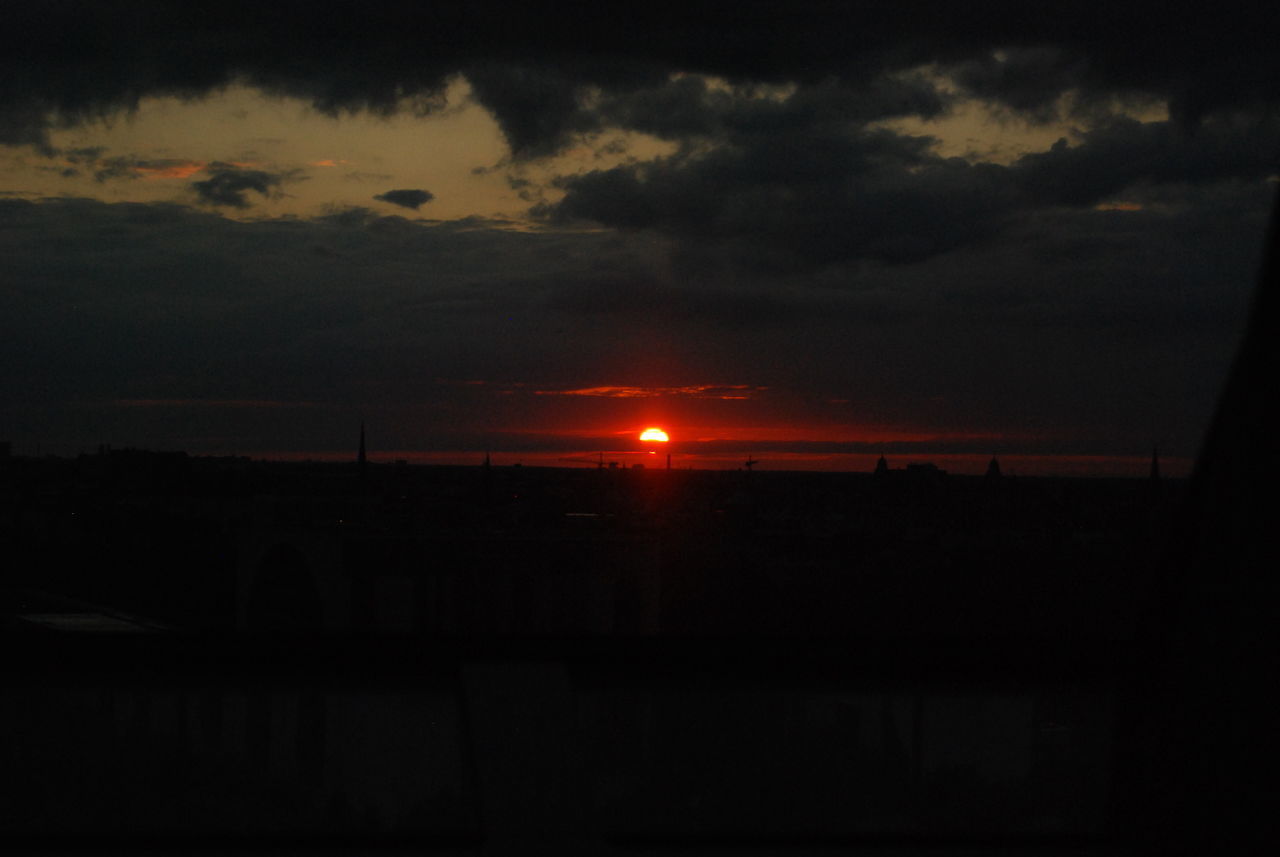 SILHOUETTE OF CITY AT SUNSET