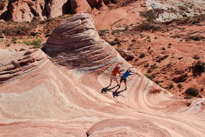 Tourists on rock formation