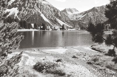 Scenic view of lake with mountains in background