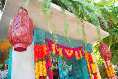 Low angle view of decorations hanging at market stall