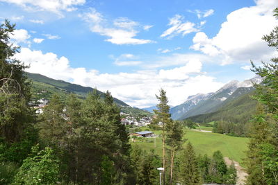 Scenic view of landscape and mountains against sky