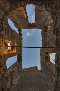 Low angle view of old building against sky